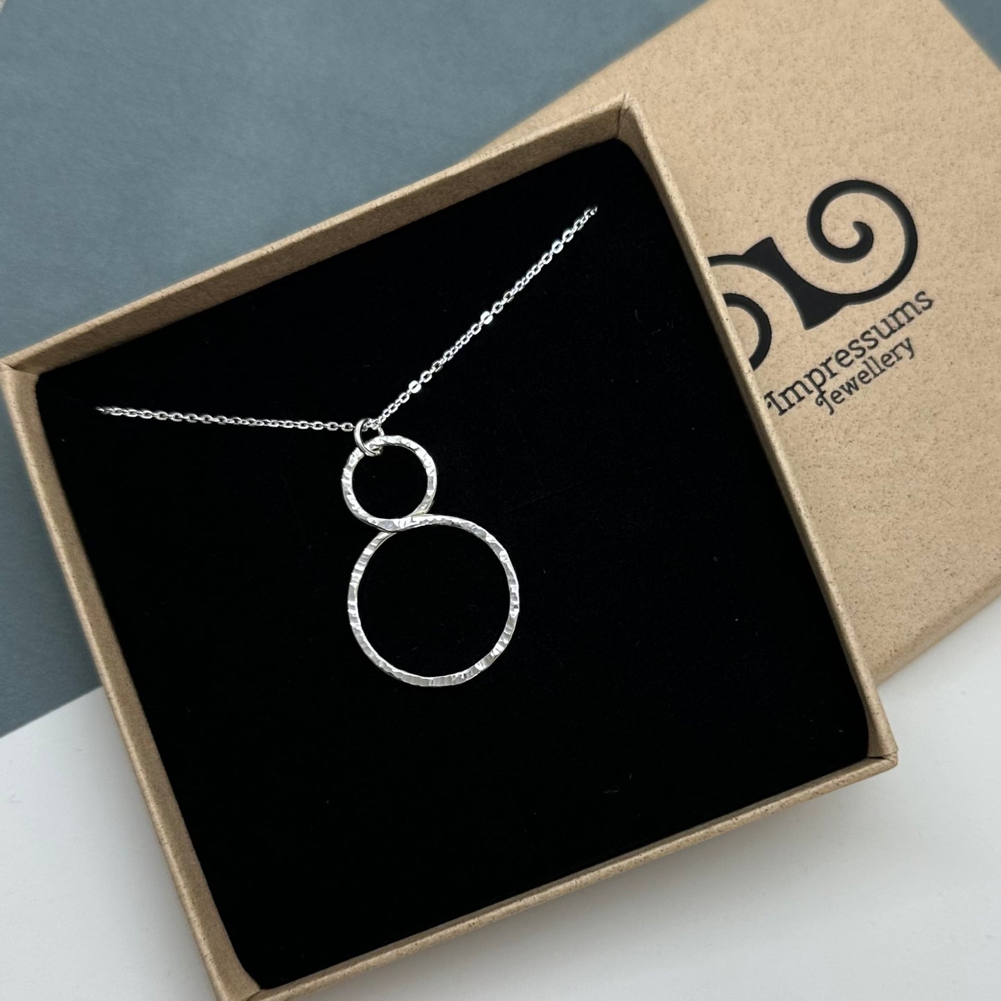 Sterling Silver Textured Infinity Pendant