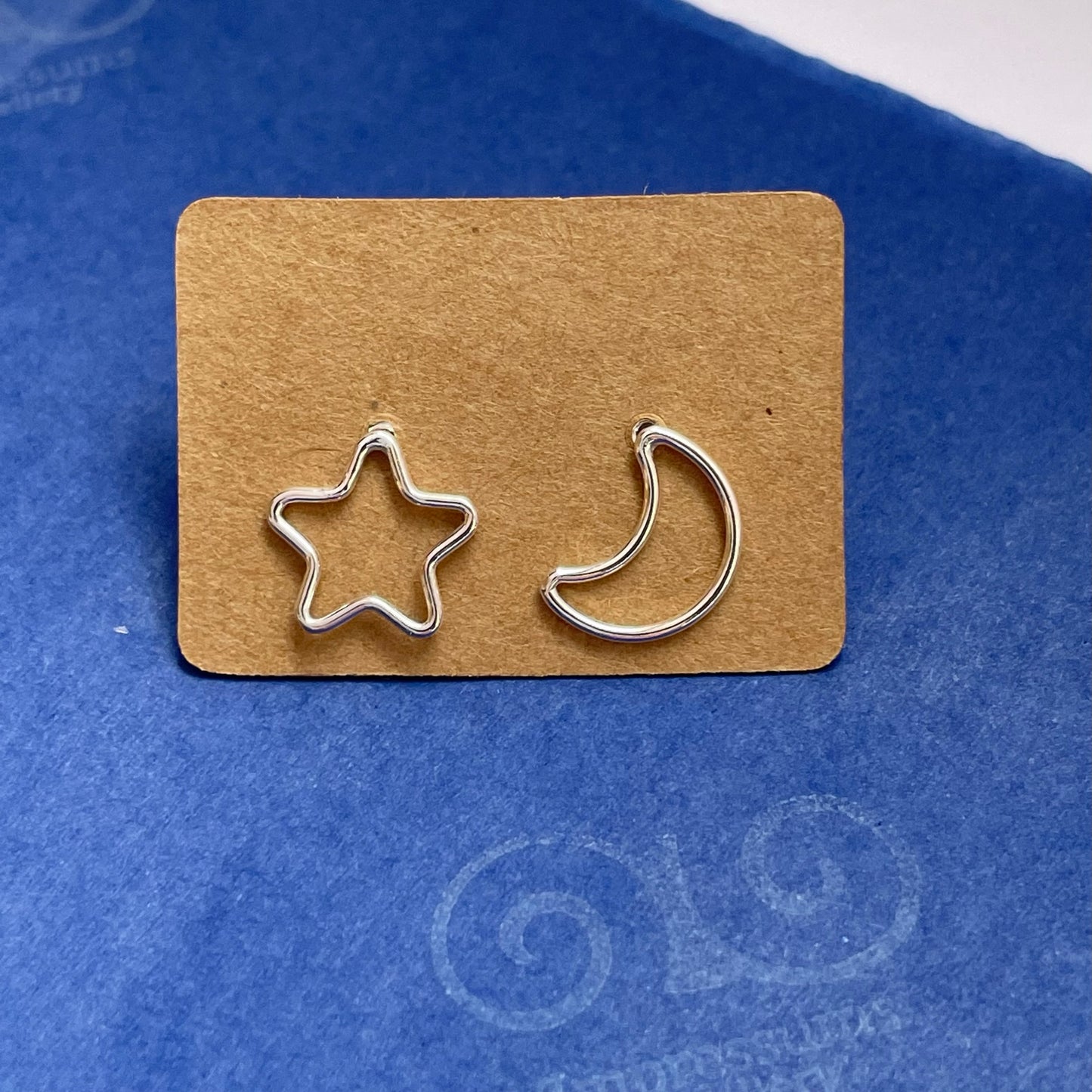 Handmade sterling silver moon and star stud earrings tissue with eco-friendly, plastic-free packaging, ready for shipping