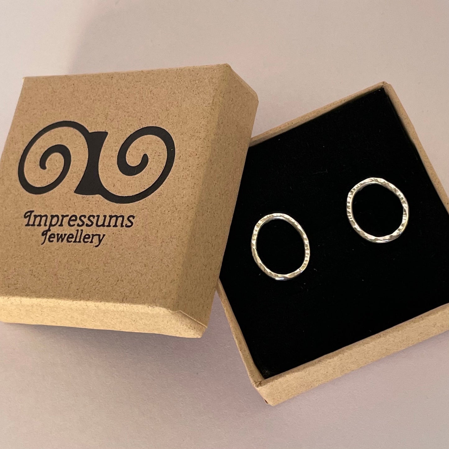 Silver Oval Stud Earrings with Hammered Texture, Sparkly Silver Studs