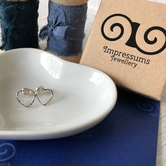 A pair of sterling silver open-heart stud earrings, beautifully presented with a branded Impressums Jewellery gift box