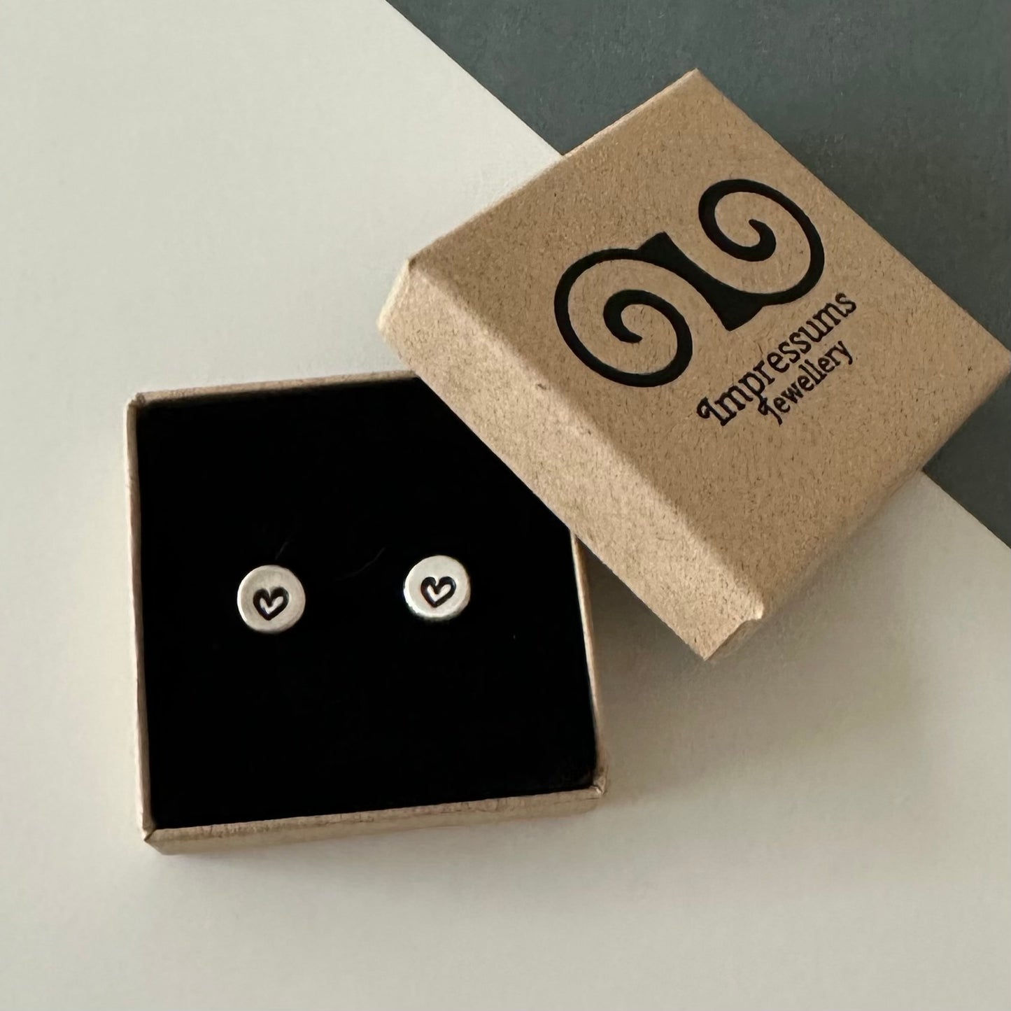 Handcrafted sterling silver sweetheart studs presented in Impressums Jewellery branded gift box, ideal for gifting