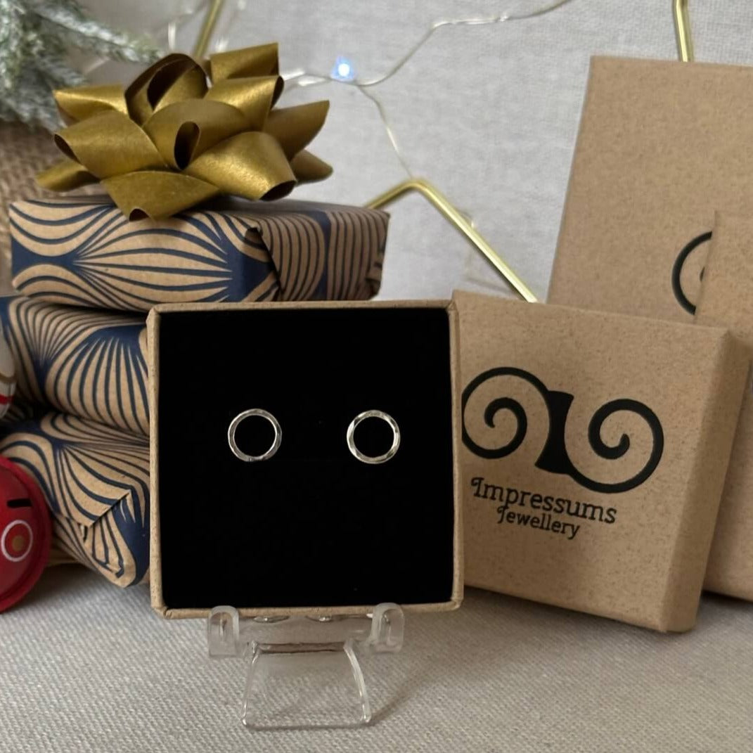 Impressums Jewellery Handmade Sterling Silver Hammered Circle Studs Pictured in an Impressums Jewellry Gift Box.