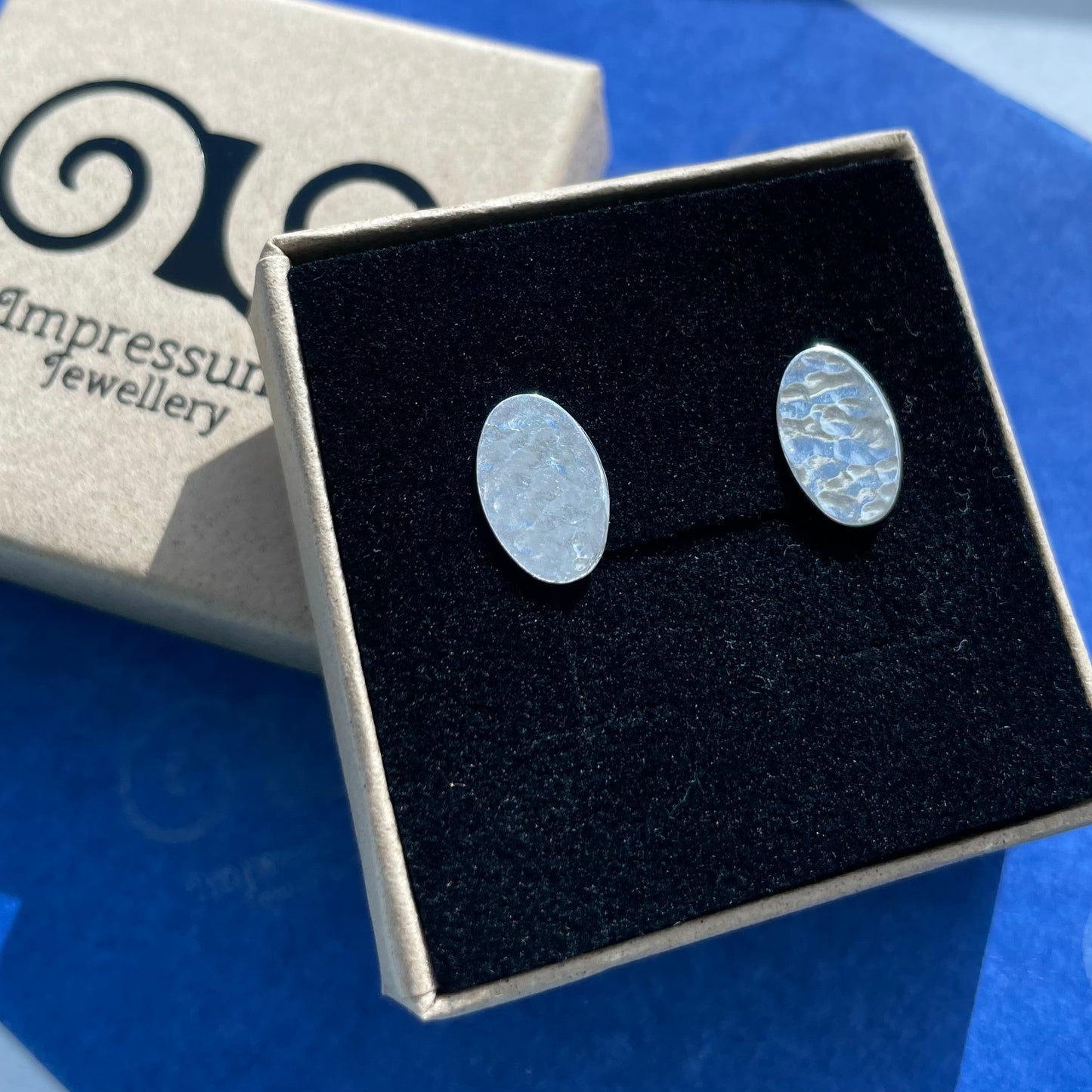 Solid Silver Oval Studs with Hammered Texture